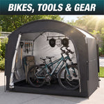 Inside the tent: bikes, helmets and garden tools